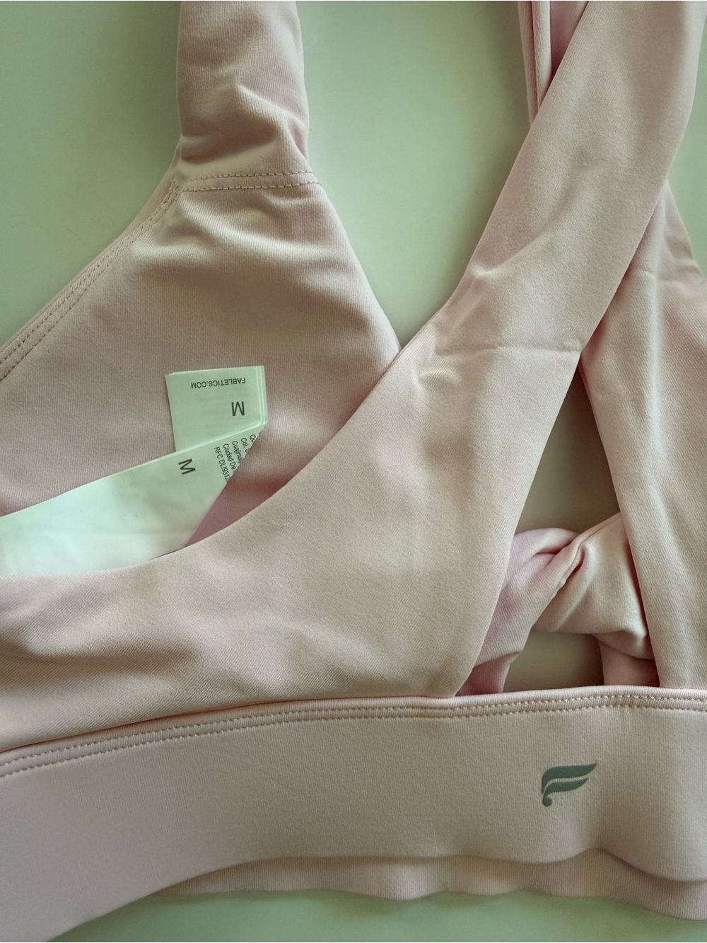 Fabletics Oasis Twist Medium Impact Sports Bra - Picture 6 of 6